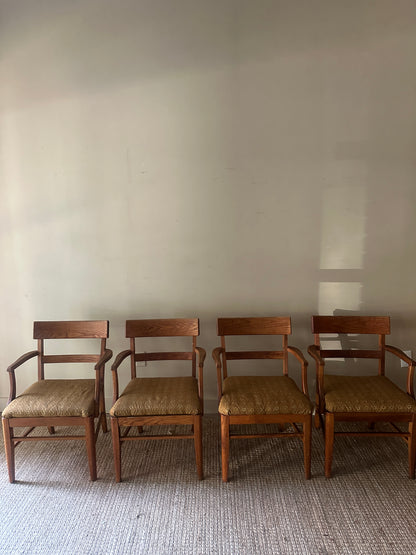 Oak arm chairs. Sold individually.