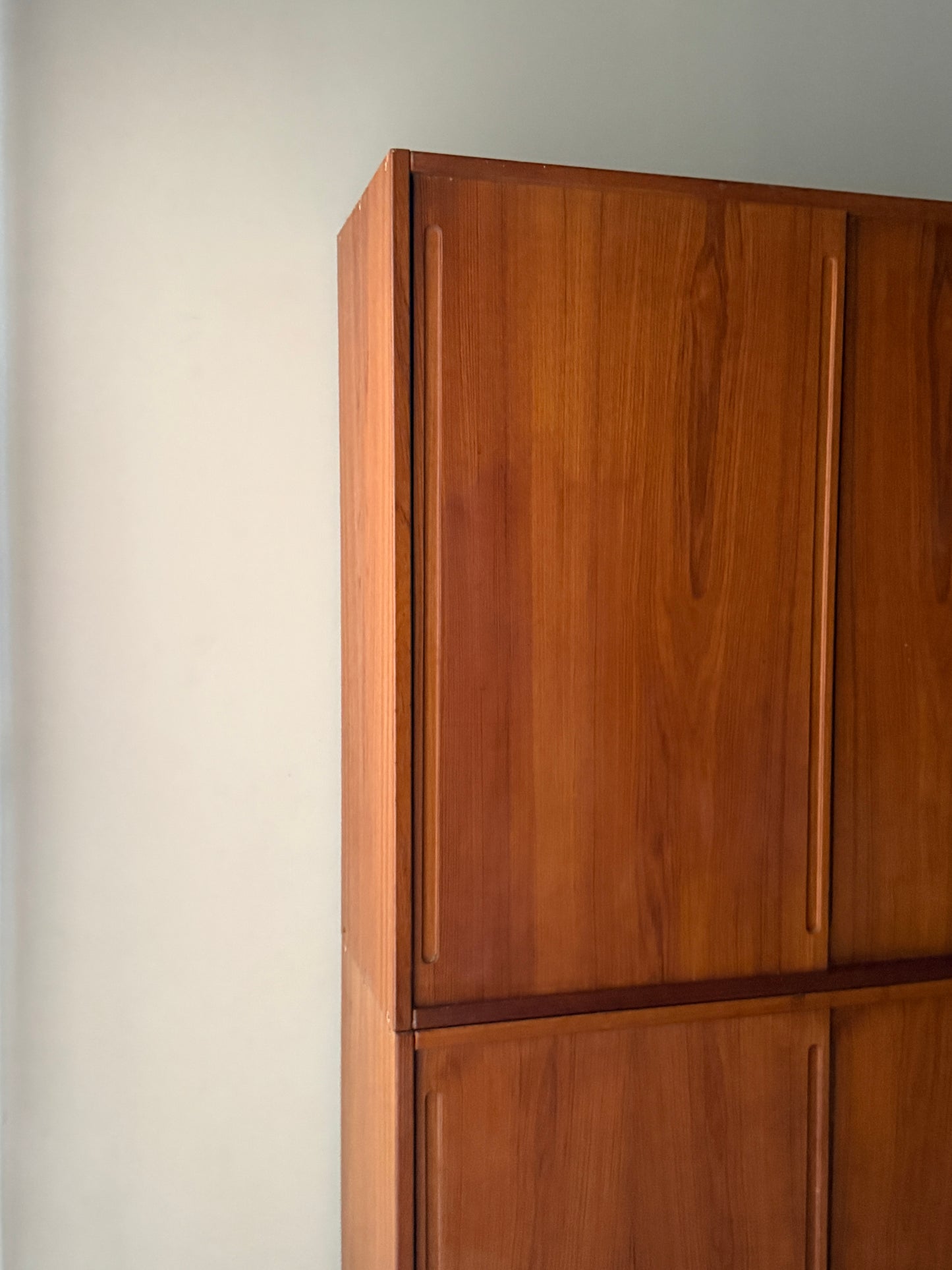 Two piece teak cabinet