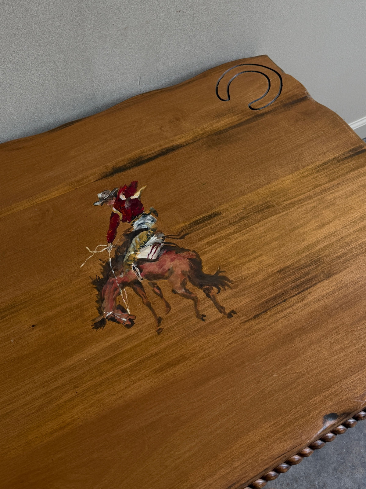 Pine coffee table with equestrian motifs