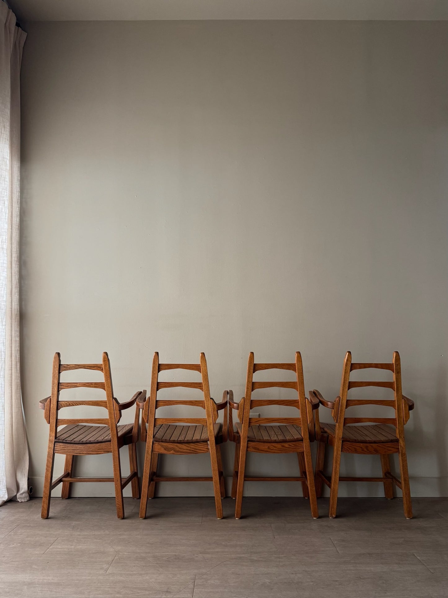 Scandinavian oak dining chairs. Sold in pairs.