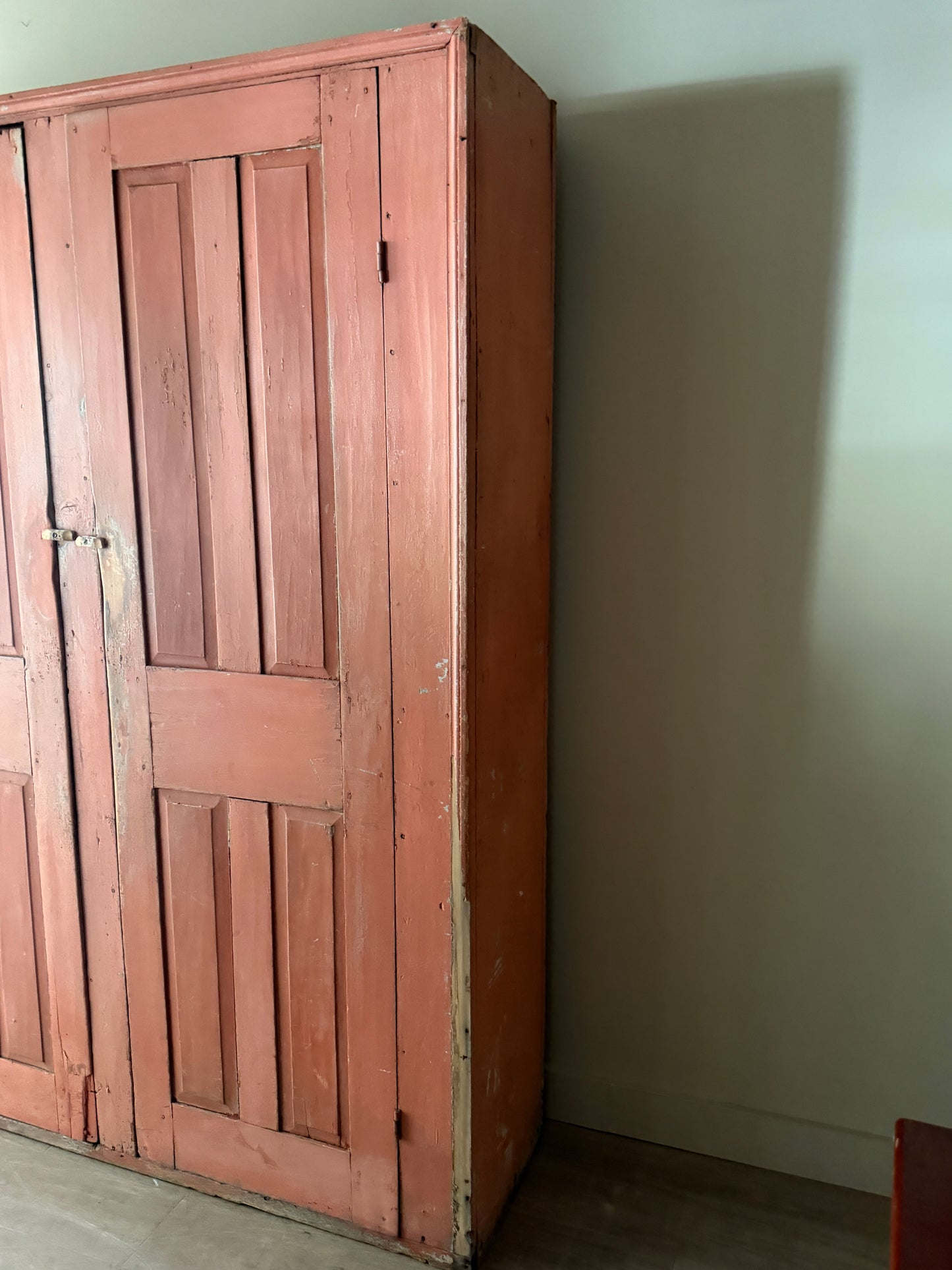 Salmon painted pine cupboard