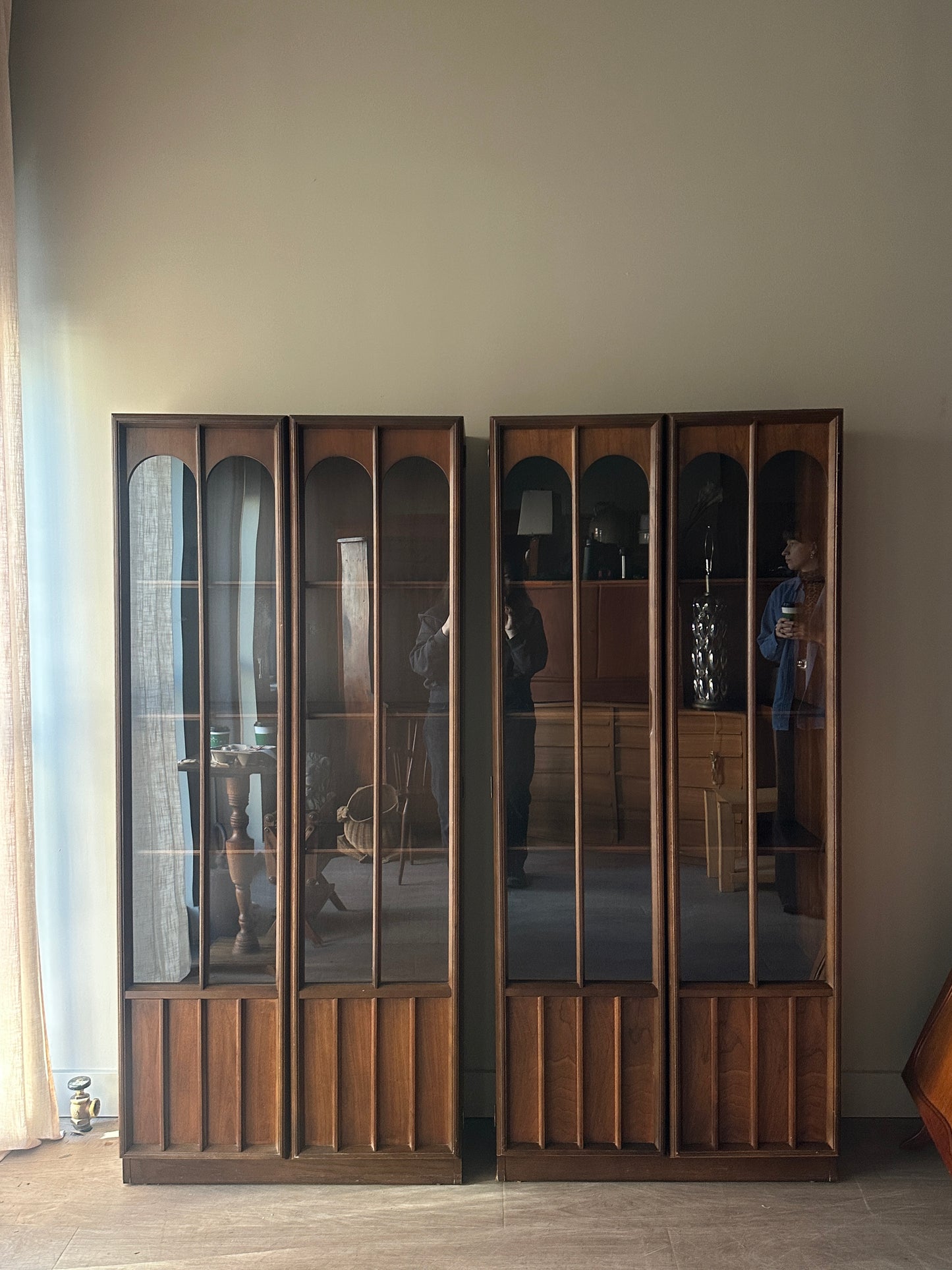Walnut display cabinets. Sold individually.