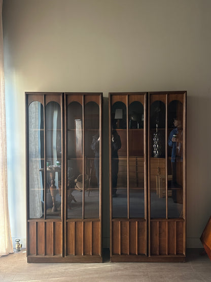 Walnut display cabinets. Sold individually.