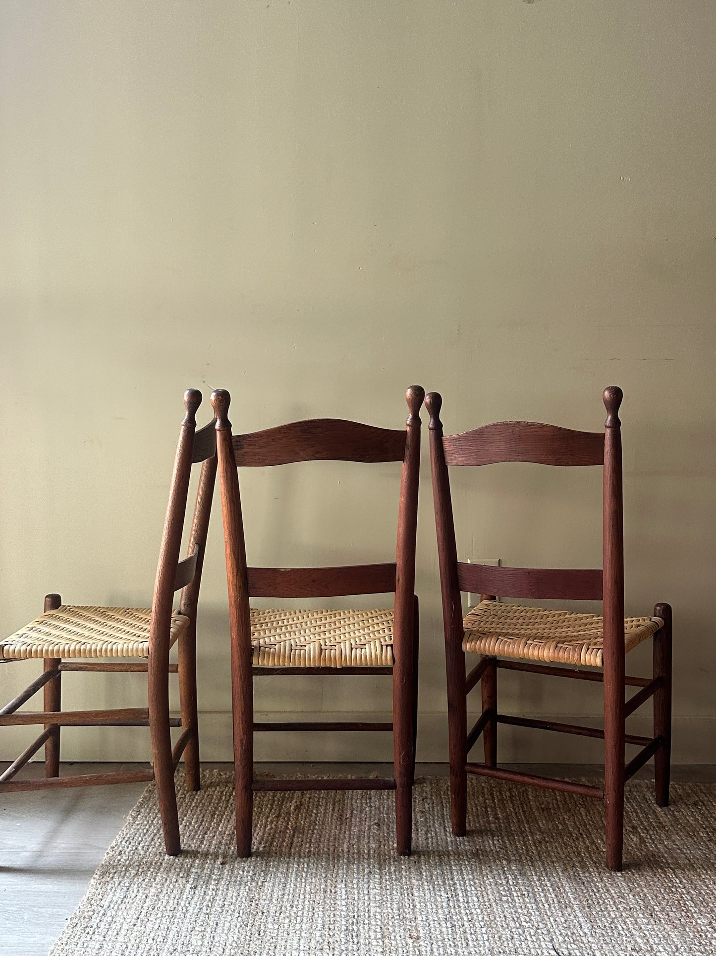 Woven seat chairs. Sold individually.