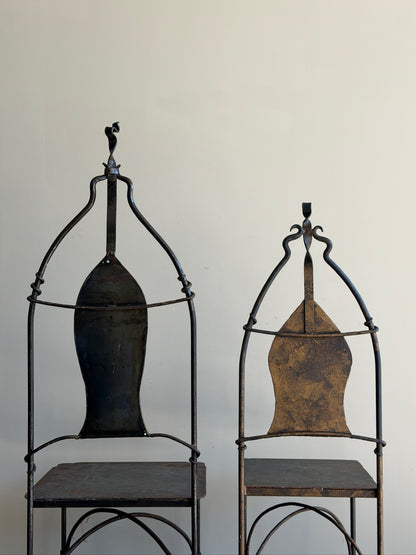 Wrought iron sculptural chairs (right)