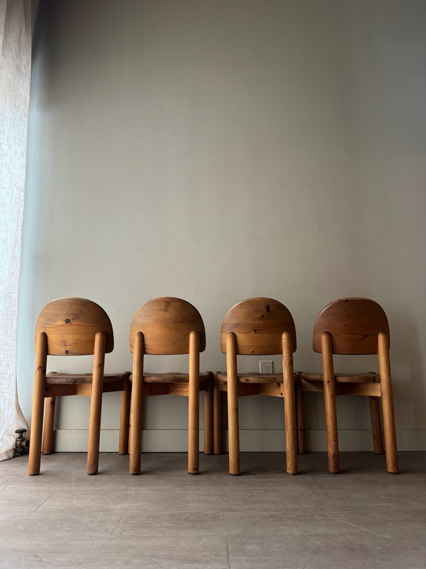 Rainer Daumiller pine dining chairs with matte finish. Sold as a set of 4.