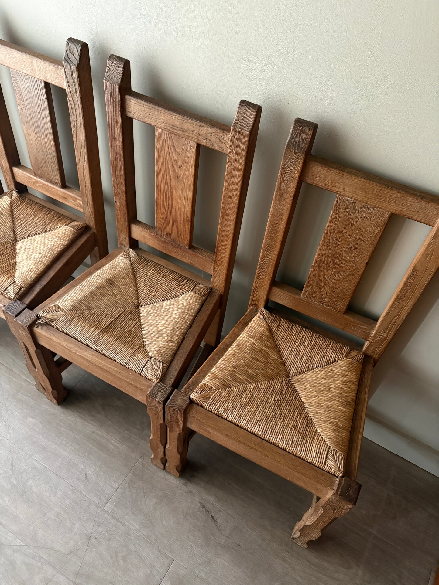 Belgian De Puydt oak & rush dining chairs. Sold in pairs.