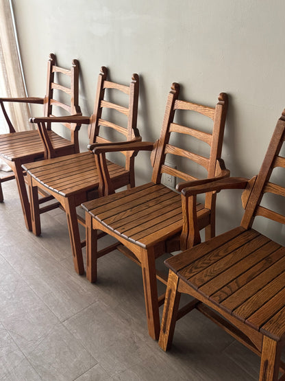 Scandinavian oak dining chairs. Sold in pairs.
