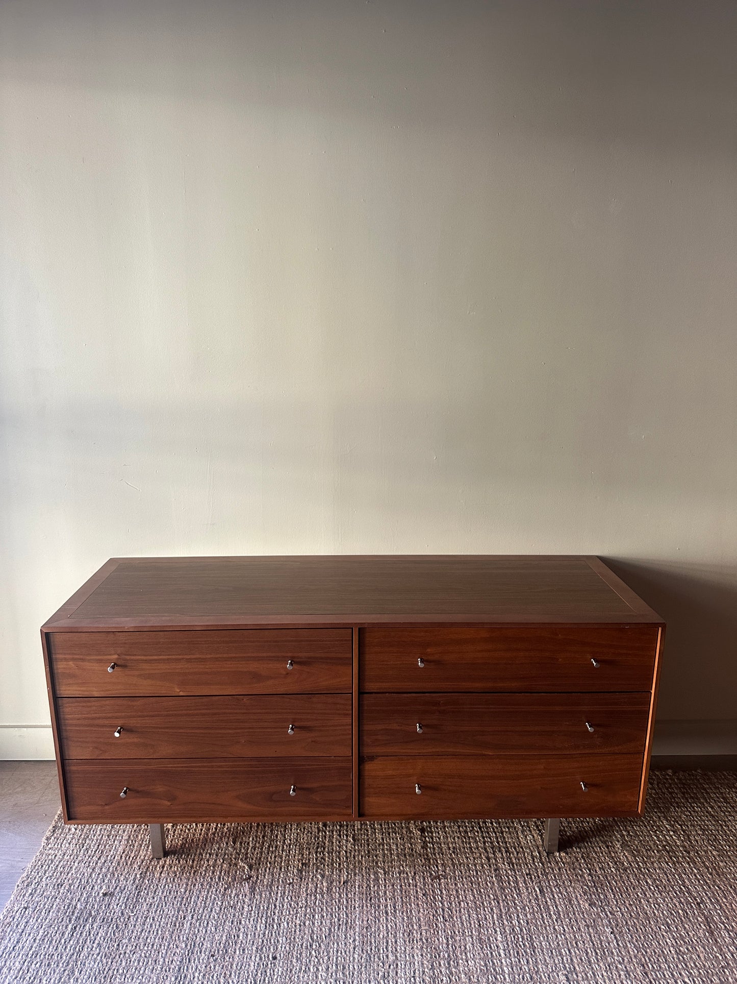 Walnut credenza with chrome knobs