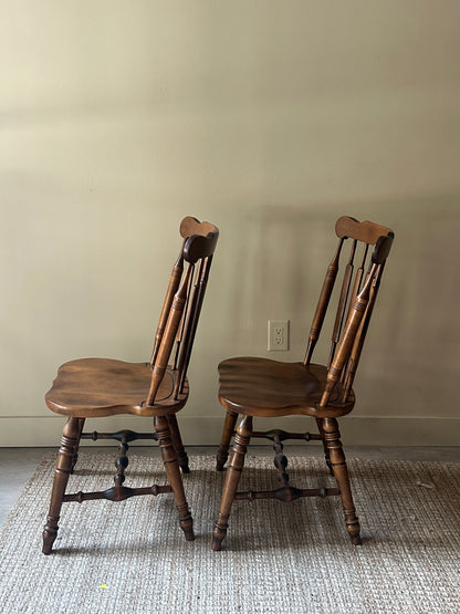 Windsor walnut chairs. Sold in pair.
