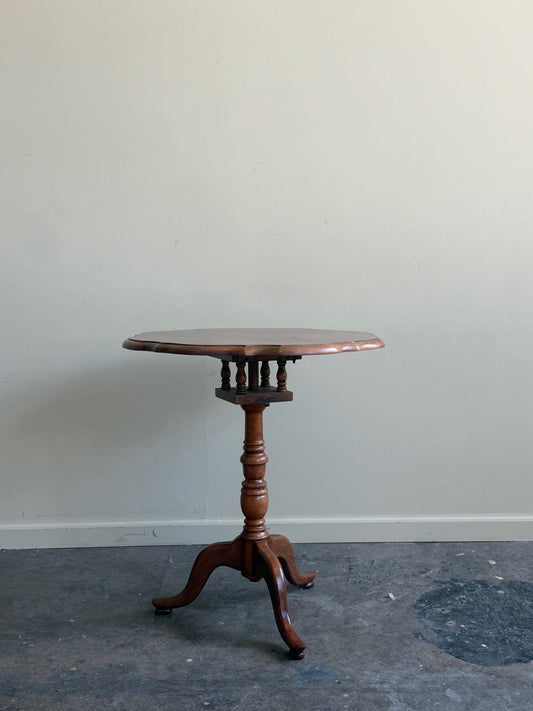 Walnut tilt-top side table