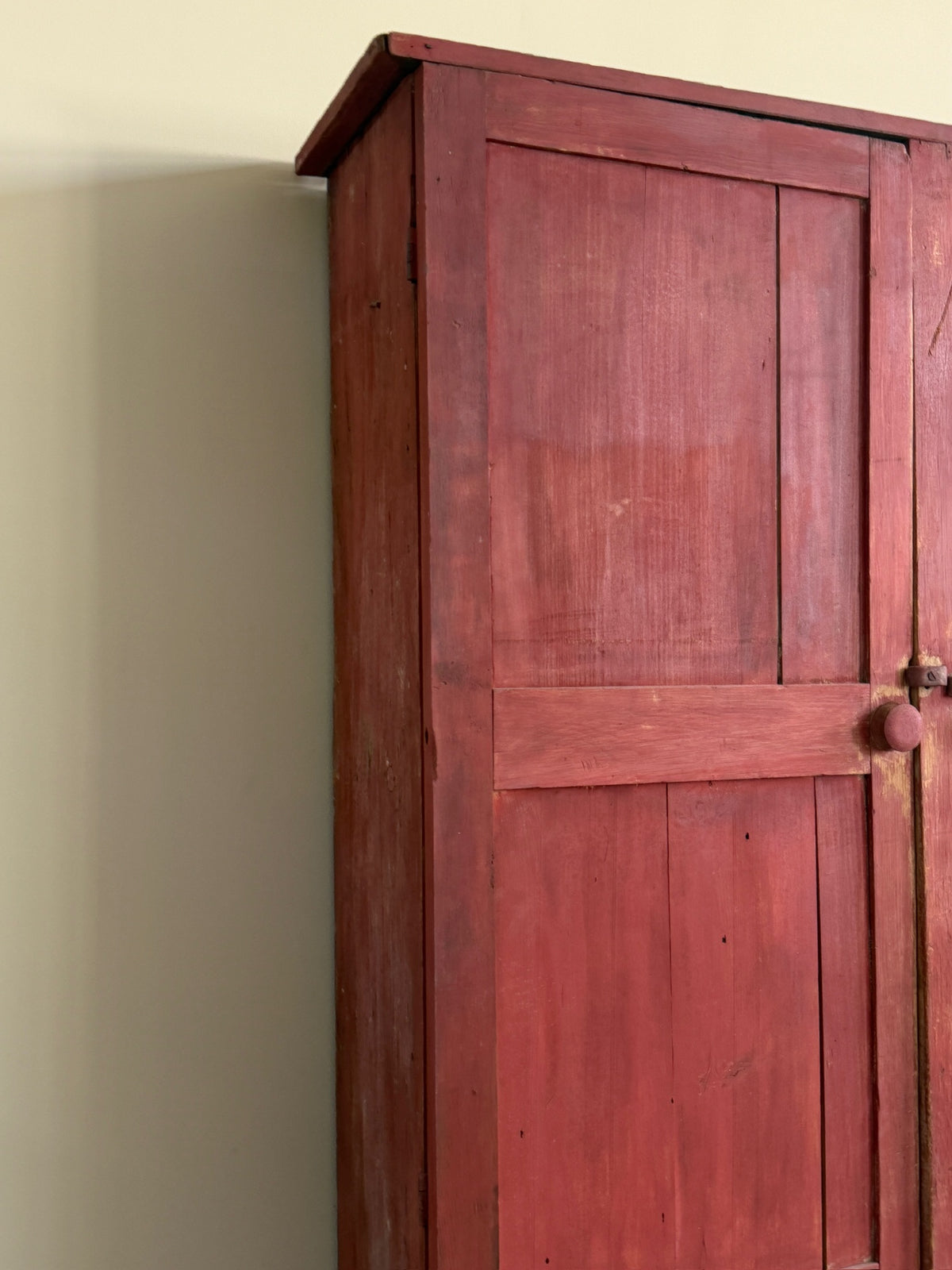 Pennsylvania red painted pine one piece stepback cupboard