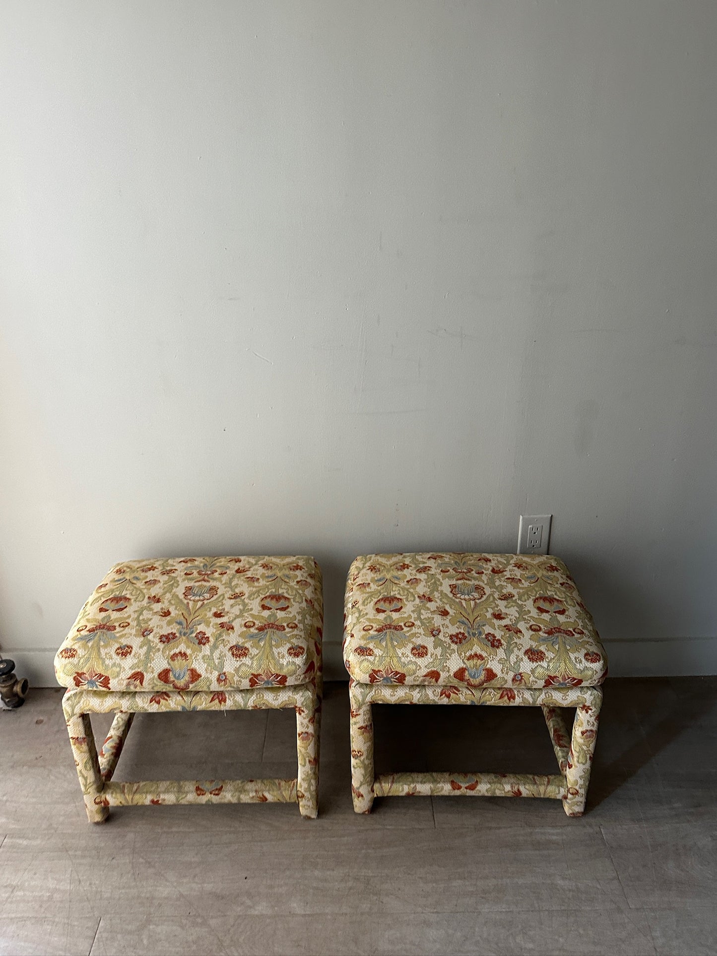 2 Milo Baughman floral upholstered stools or ottomans. Sold individually.