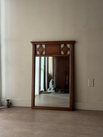 Carved walnut mirror