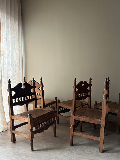 6 hand carved chairs. Sold individually.
