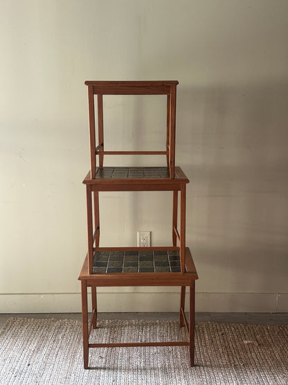 Tile top teak nesting tables