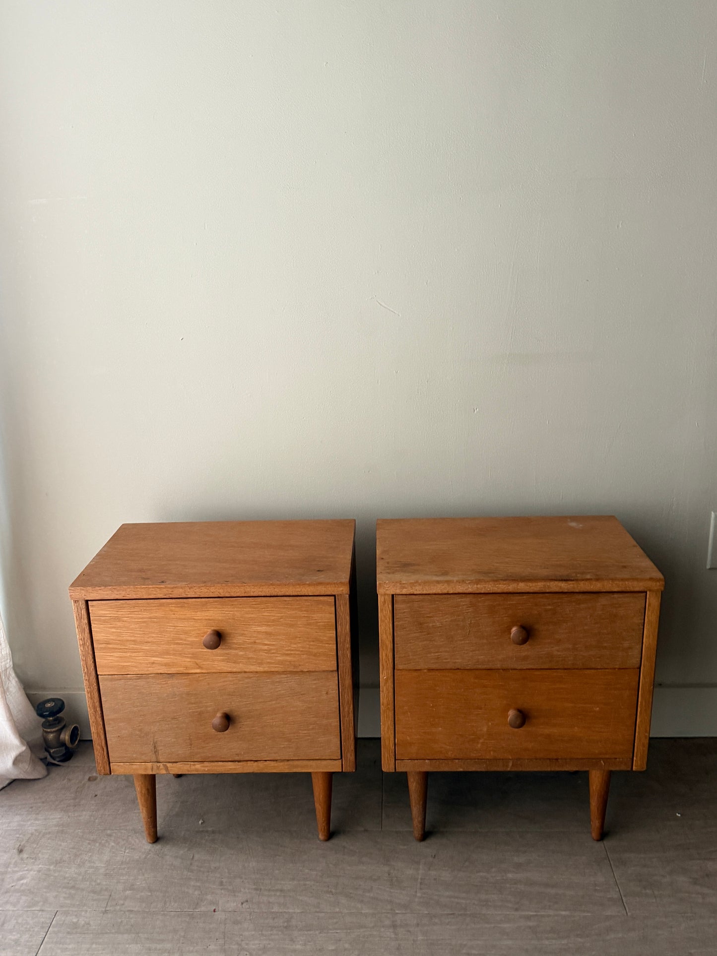 Pair of pencil leg bedside tables. Sold as pair.