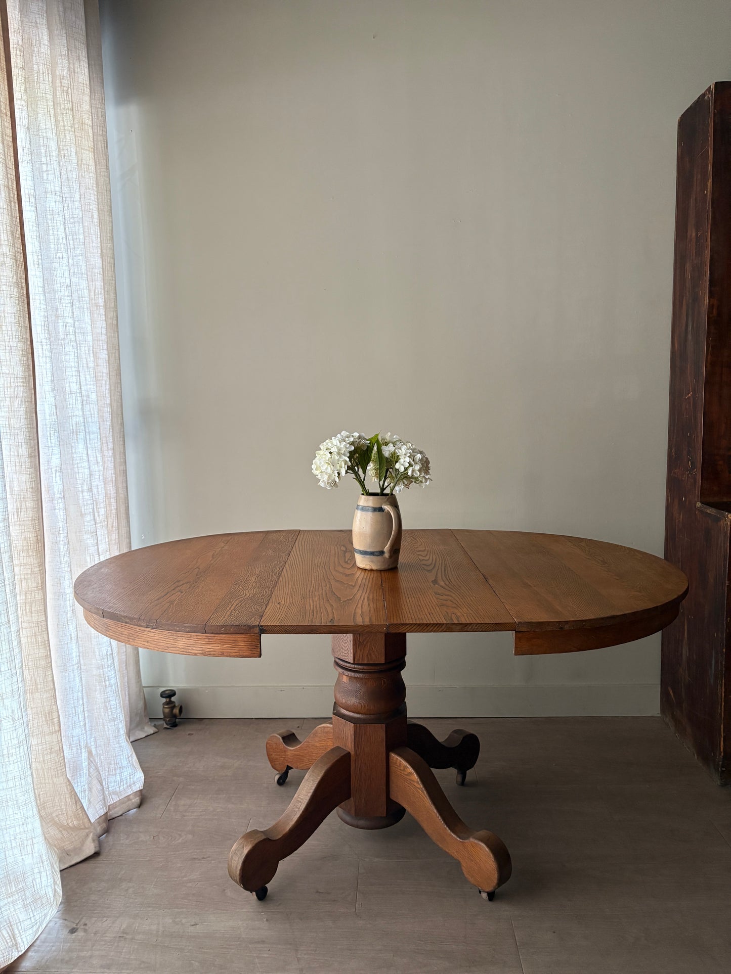 Oak dining table with extensions