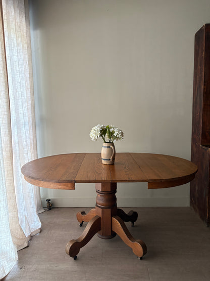 Oak dining table with extensions