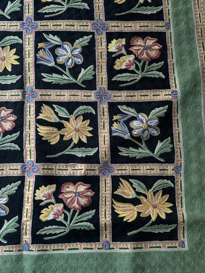 Wool flower rug 5’ x 8’