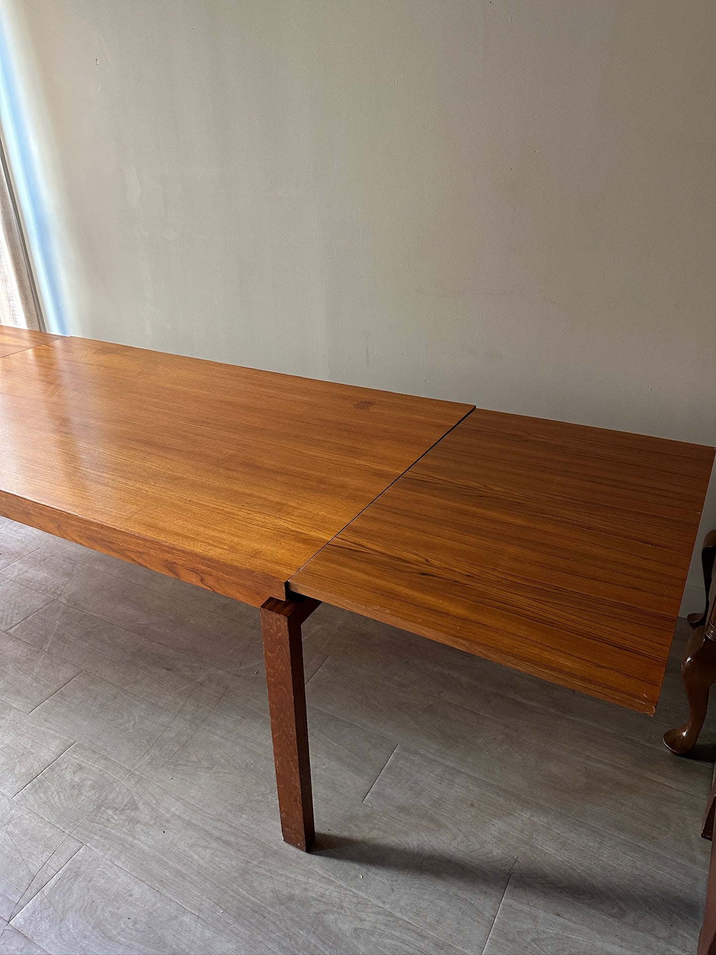 Teak extending dining table