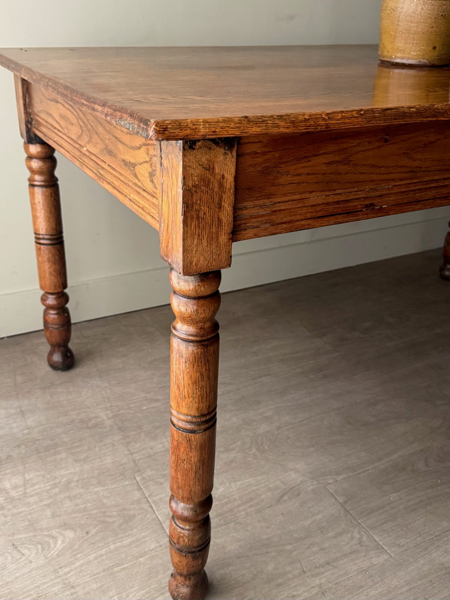 Golden oak dining table