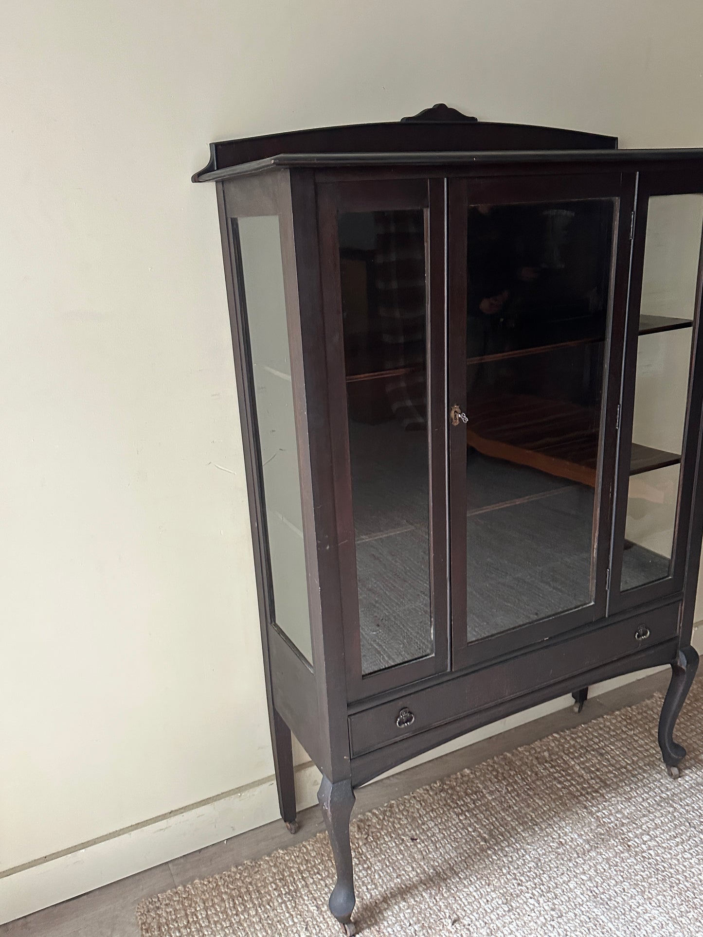 Dark stained mahogany display case