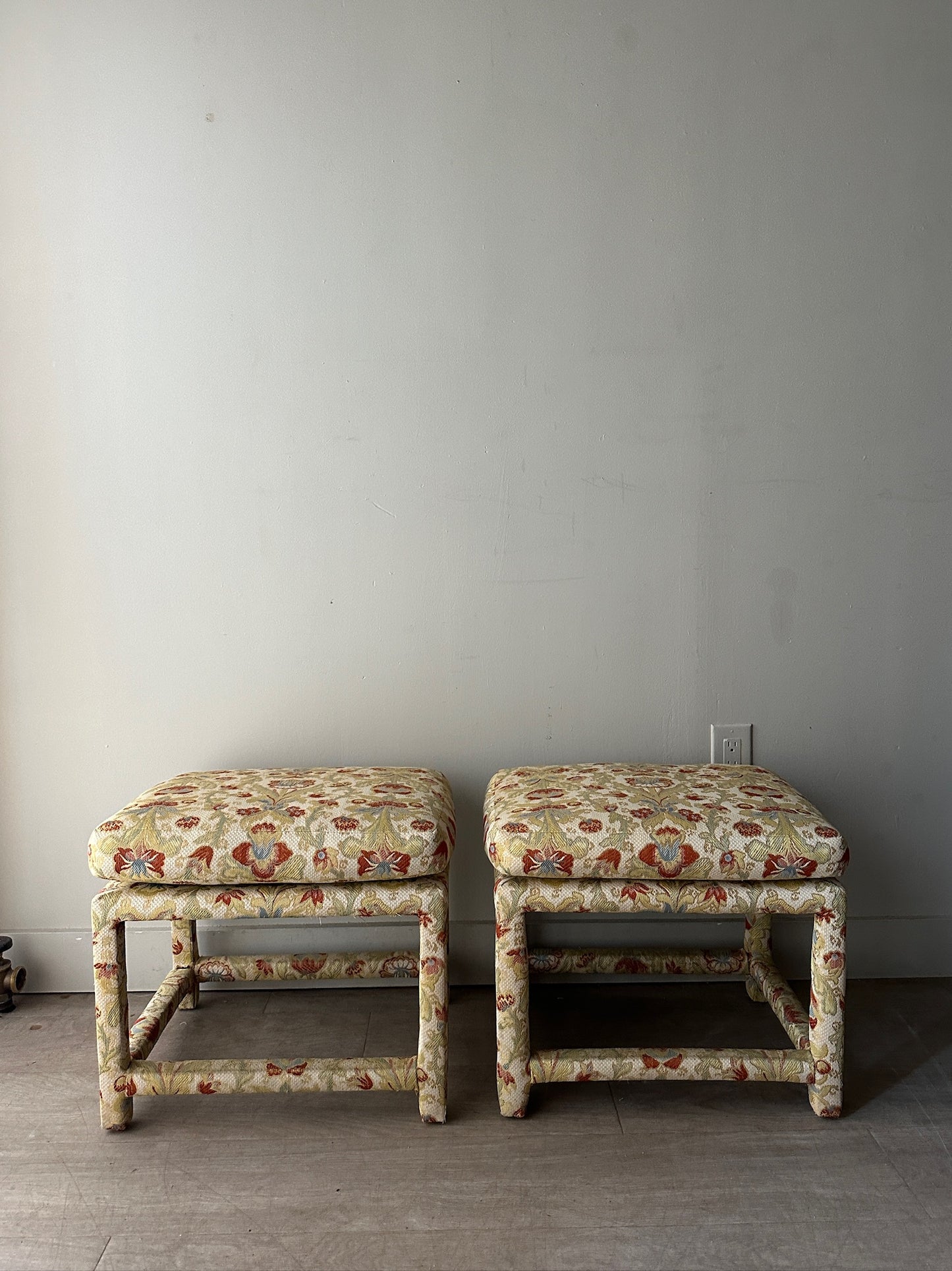 2 Milo Baughman floral upholstered stools or ottomans. Sold individually.