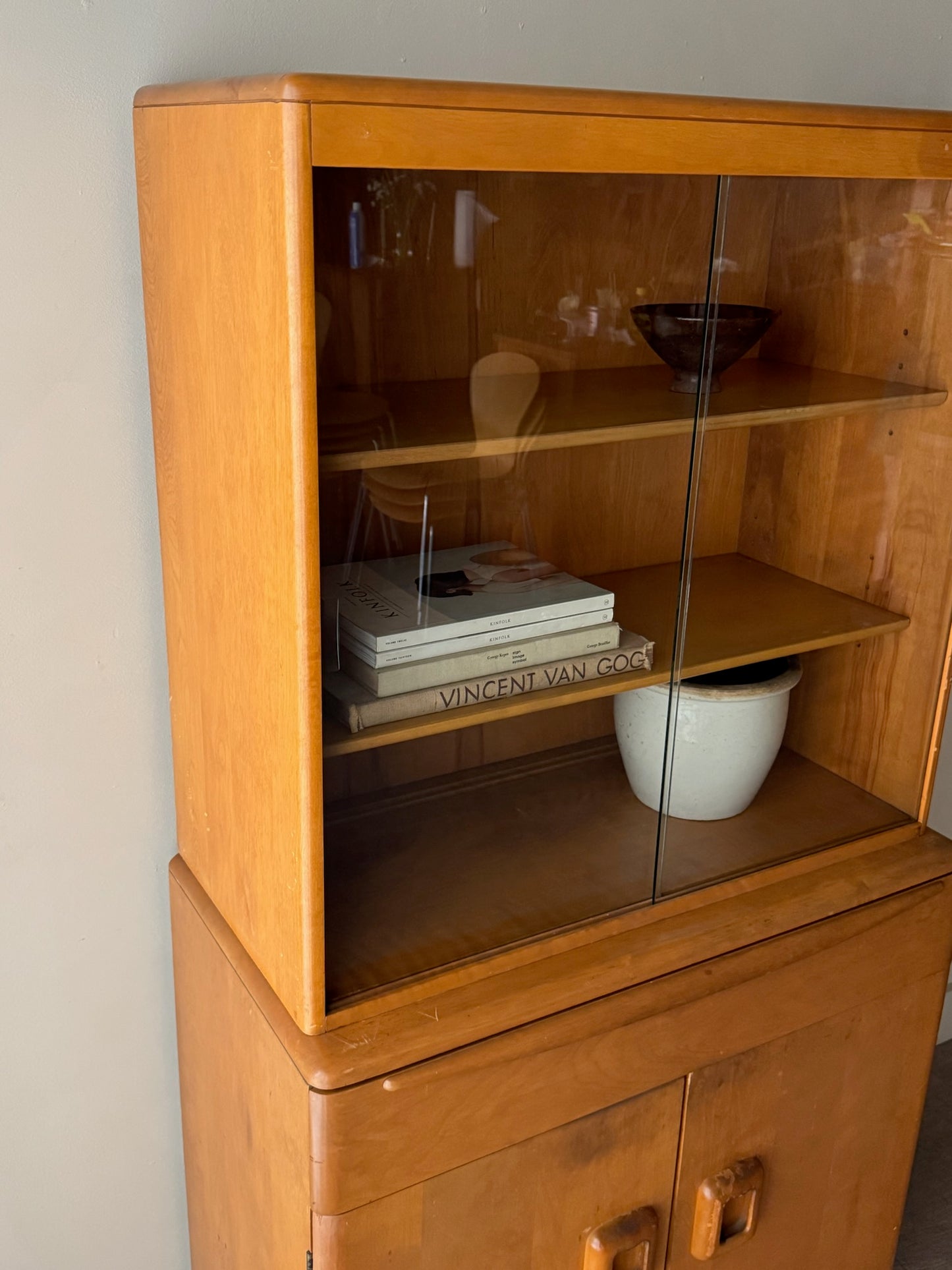Heywood Wakefield maple two piece display cabinet