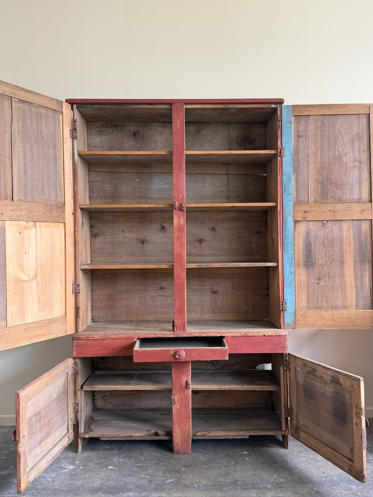 Pennsylvania red painted pine one piece stepback cupboard