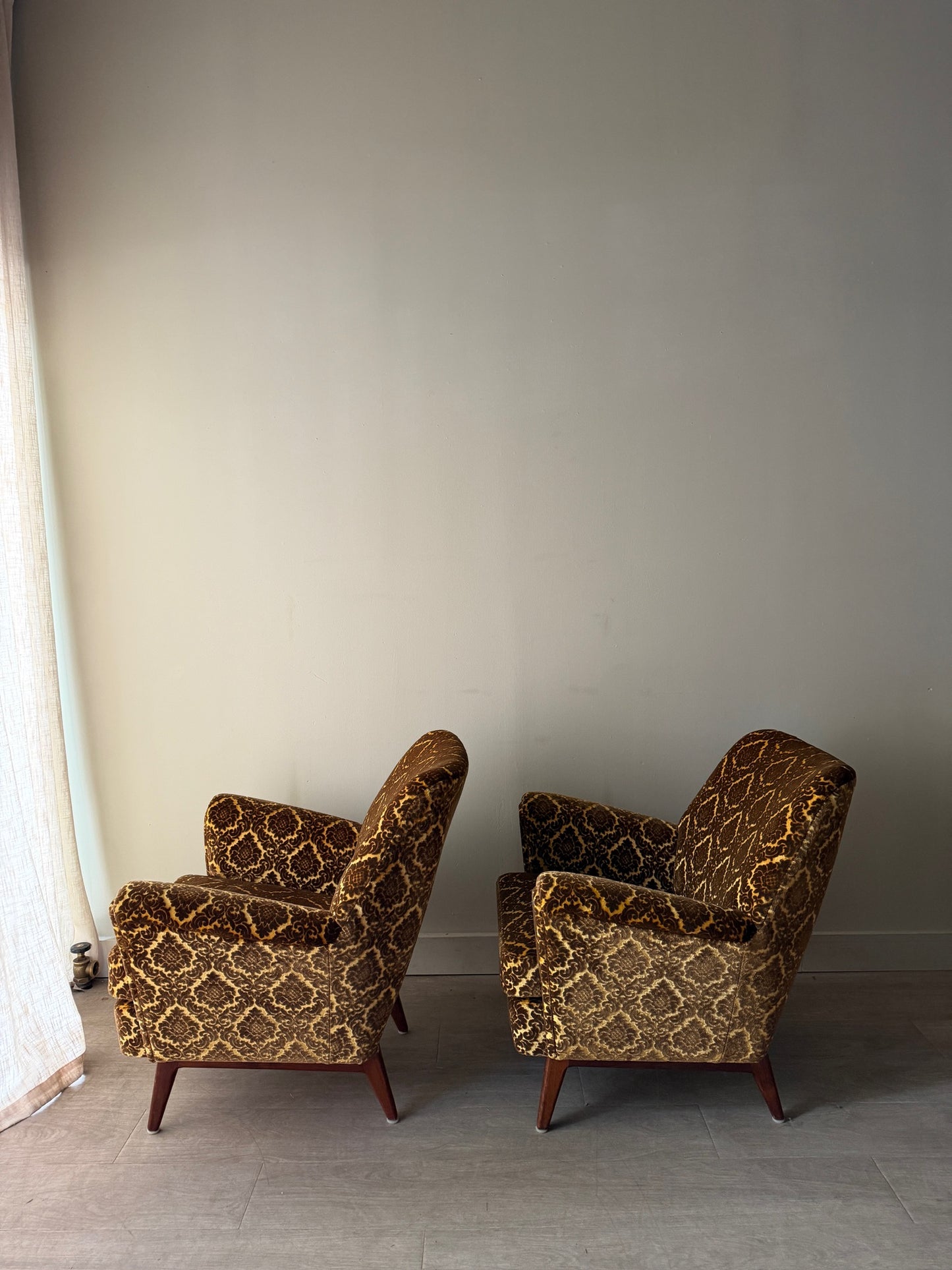 Swedish velvet club chairs. Sold individually.