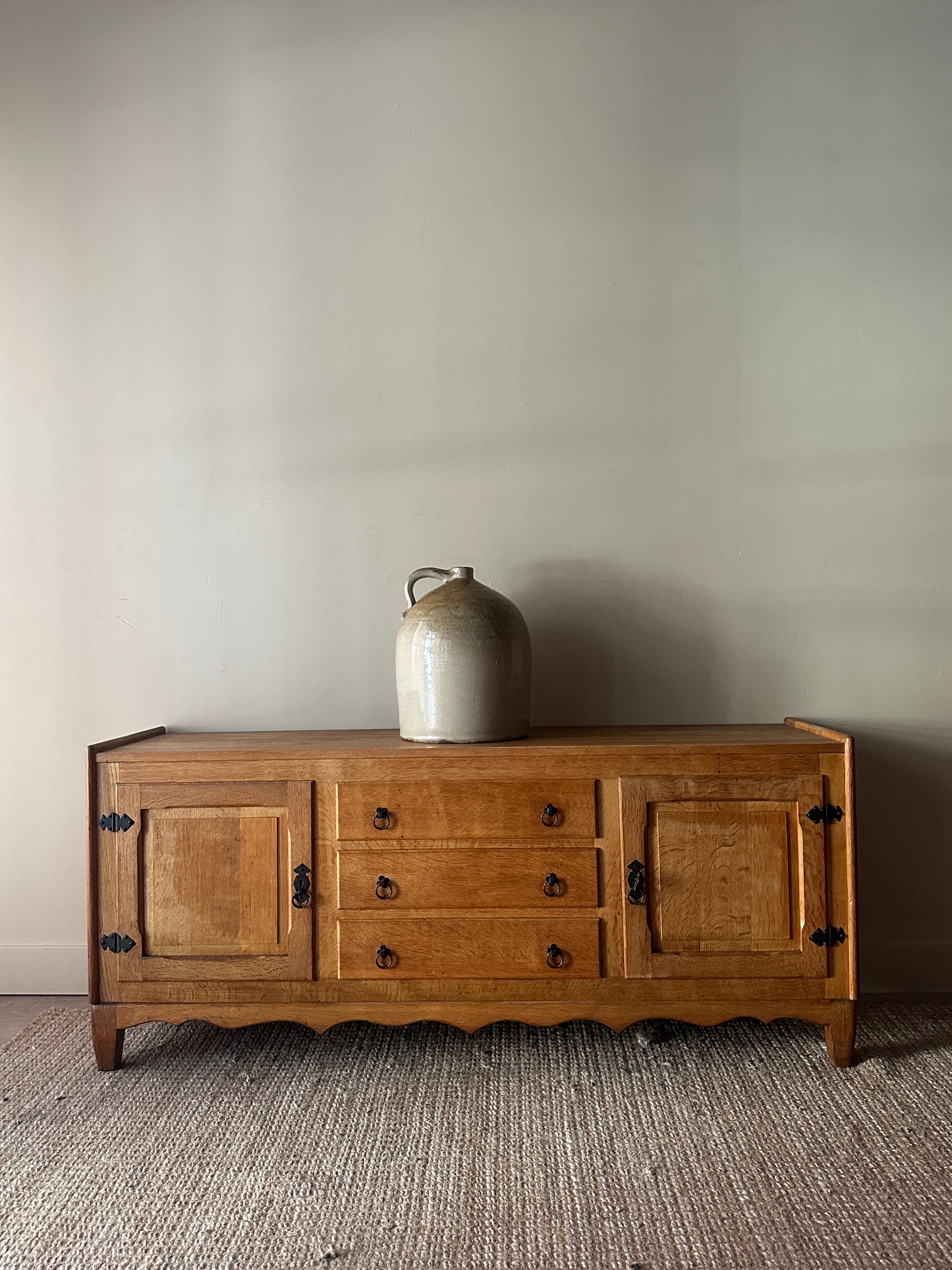Danish oak sideboard with iron handles by Henning Kjaernulf
