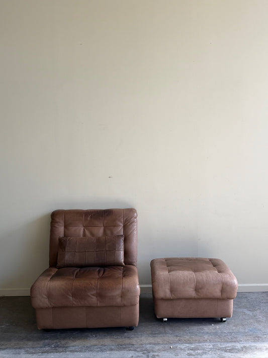 Swiss brown leather lounge chair with ottoman