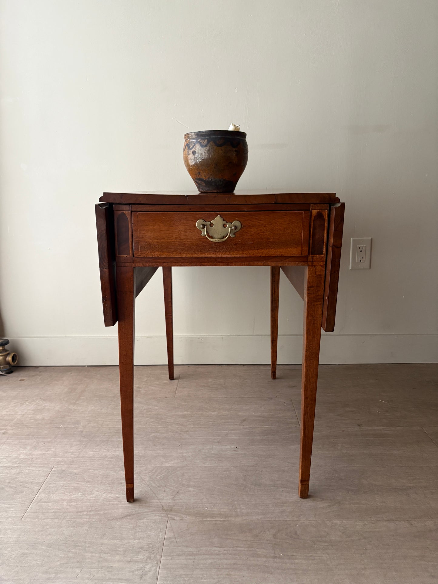 Inlaid walnut drop leaf table