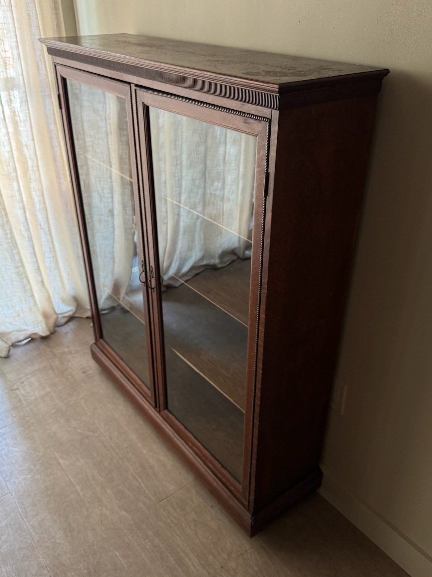 Golden oak display cabinet