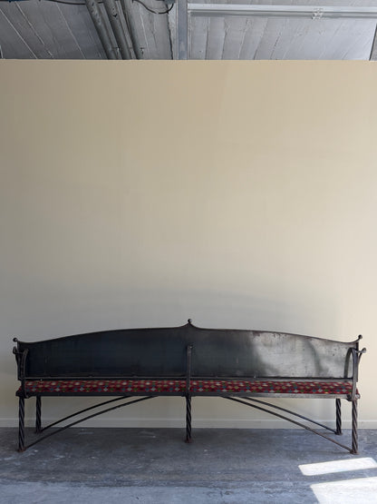 Wrought iron sculptural bench