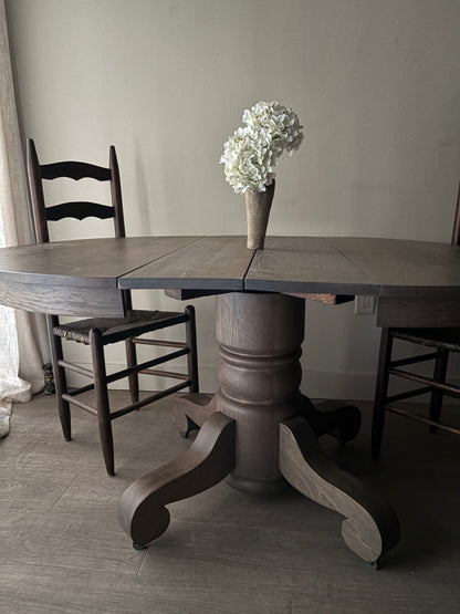 Golden oak dining table with extensions