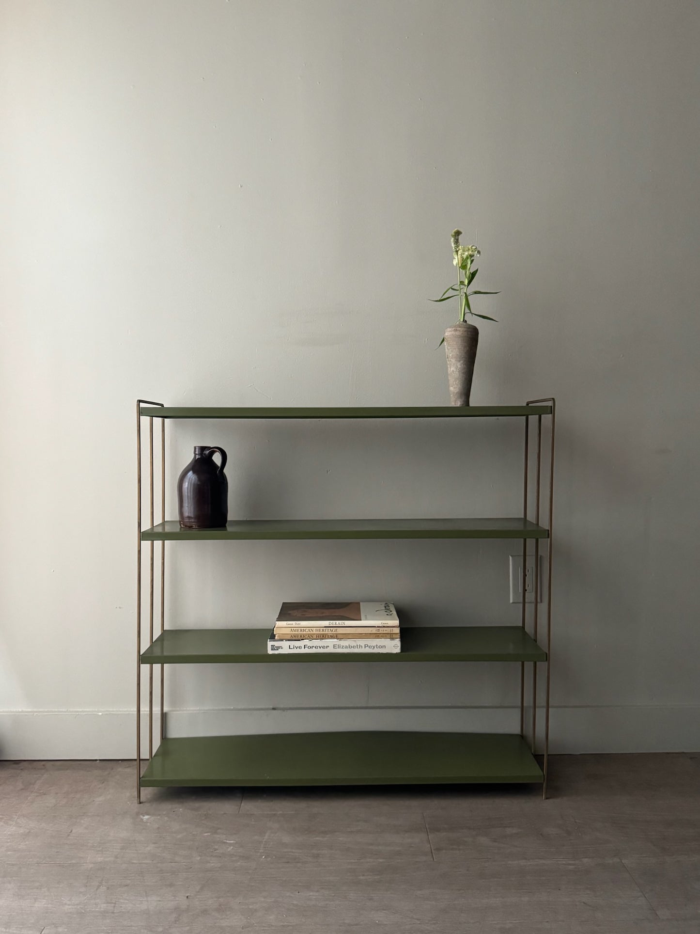 Green metal bookshelf
