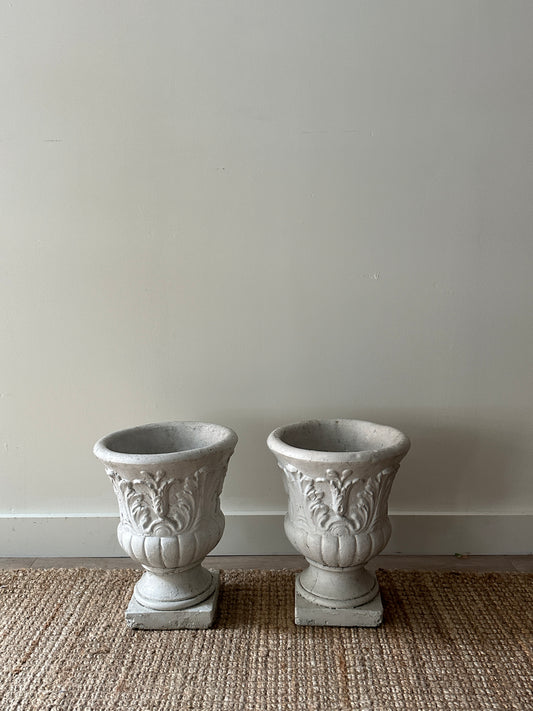 Concrete urns. Sold individually.