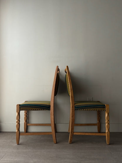Danish oak dining chairs with striped upholstery. Sold in pairs.