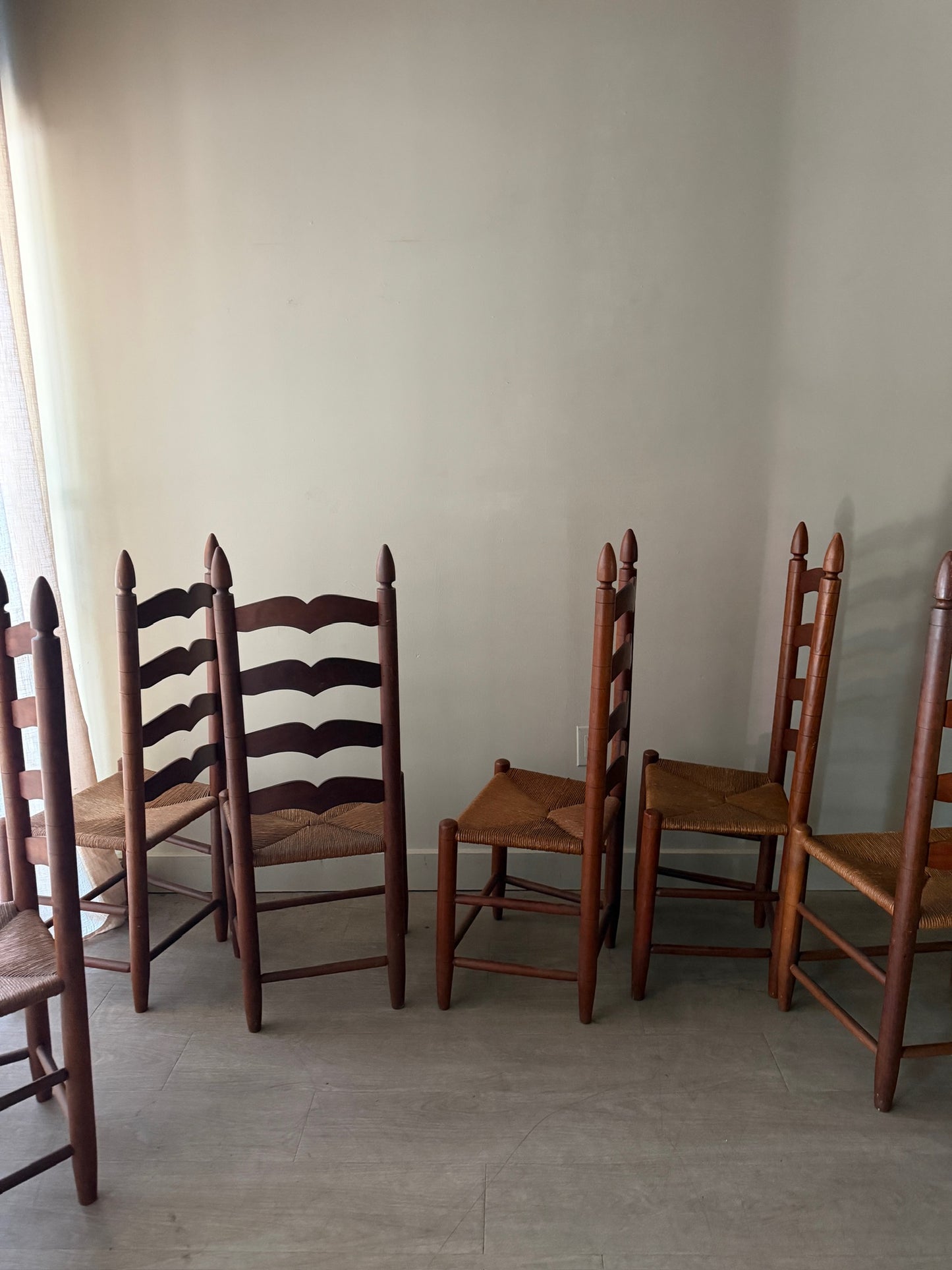 Cherry ladder back rush seat dining chairs. Sold in pairs.
