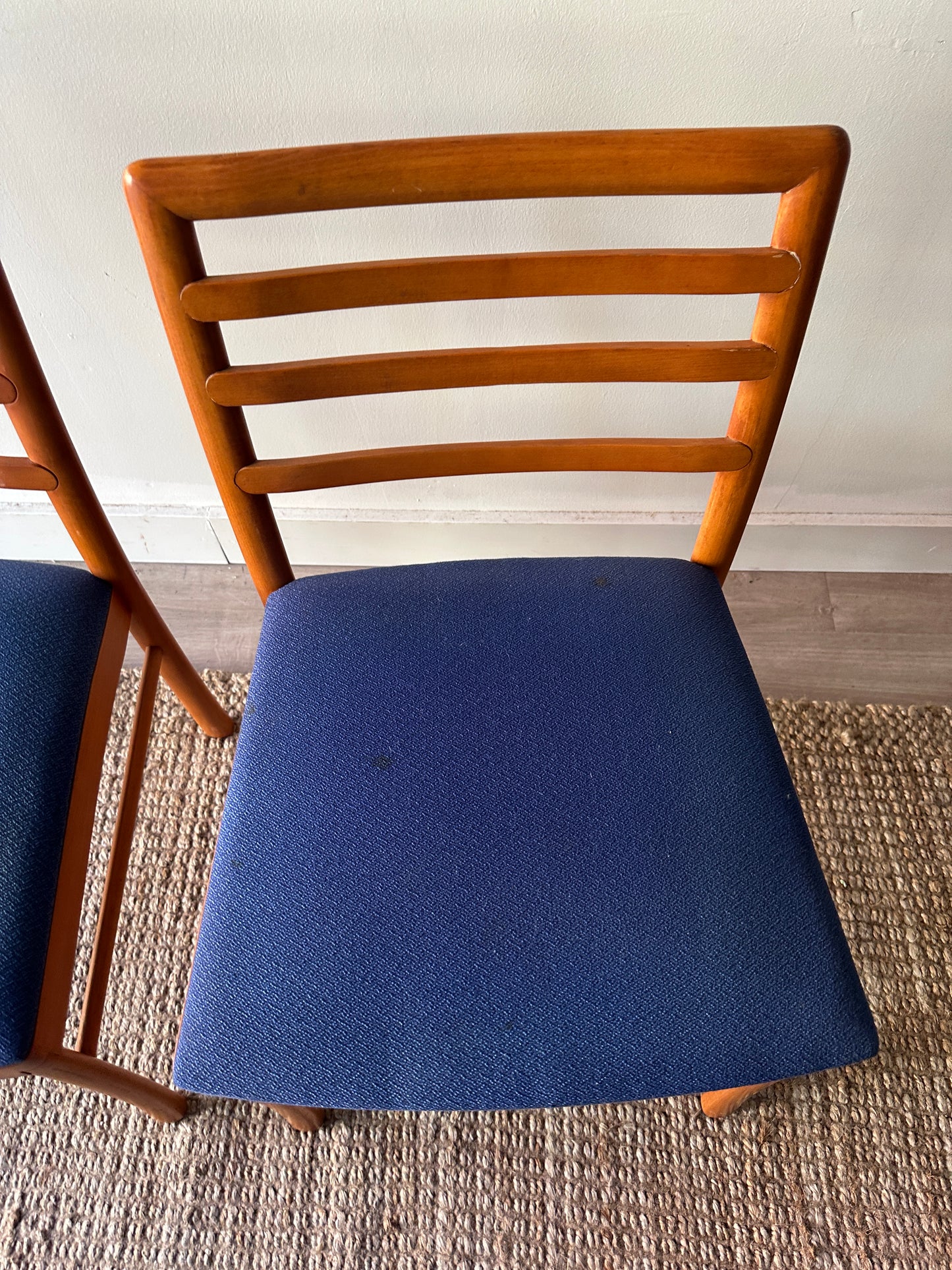 2 maple dining chairs. Sold individually.