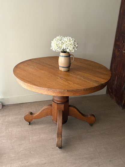 Oak dining table with extensions