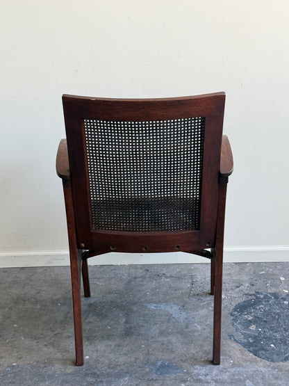 Golden oak caned armchair
