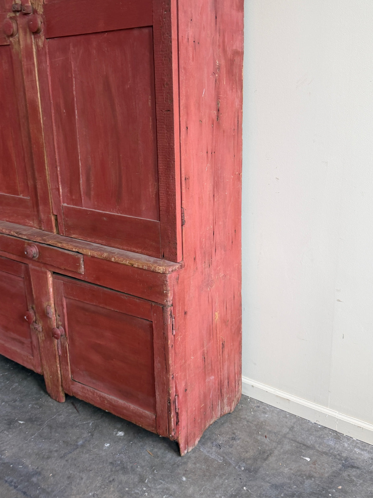 Pennsylvania red painted pine one piece stepback cupboard