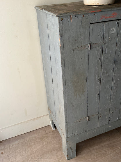 Blue painted cupboard