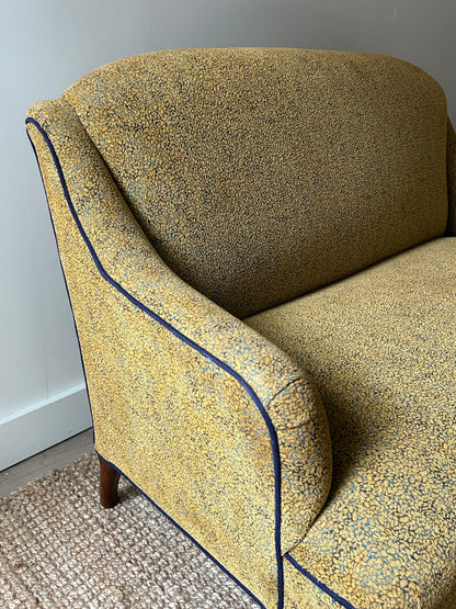 Brocade settee with navy piping