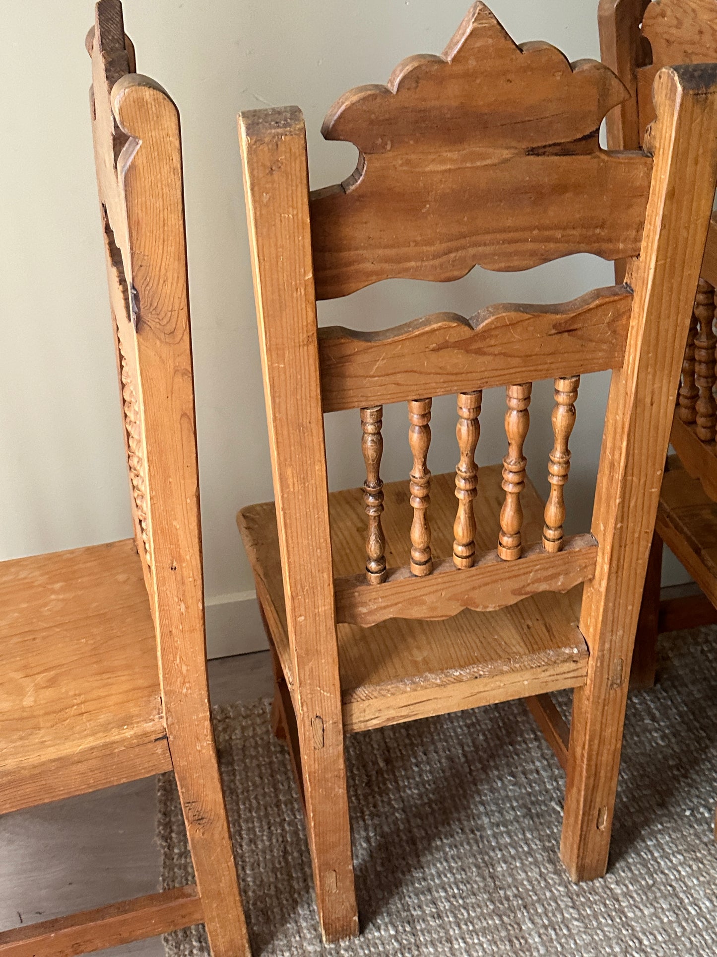 Hand carved pine dining chairs. (Sets of 2).