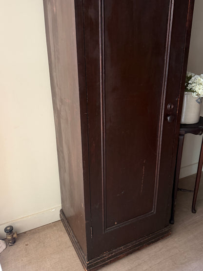 Dark stained chimney cupboard