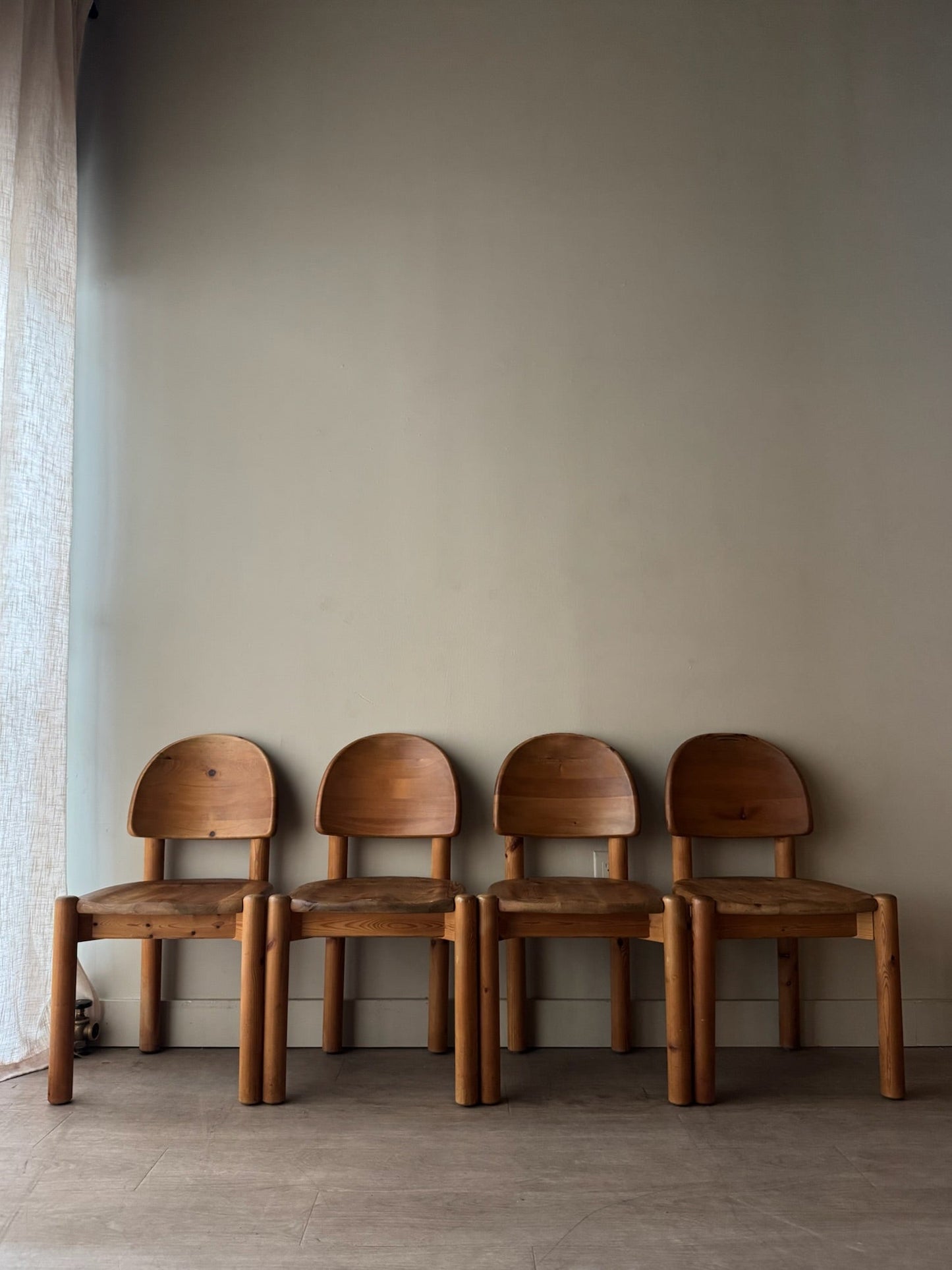Rainer Daumiller pine dining chairs with matte finish. Sold as a set of 4.